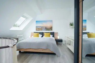Ein Bett oder Betten in einem Zimmer der Unterkunft Seepark Scharbeutz Seepark 3 9 Scharbeutz