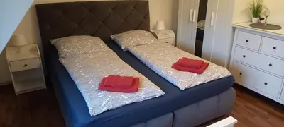 Ein Bett oder Betten in einem Zimmer der Unterkunft Ferienwohnung Resi