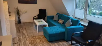 Ein Sitzbereich in der Unterkunft Ferienwohnung Resi