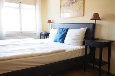Ein Bett oder Betten in einem Zimmer der Unterkunft Hotel Restaurant Iris