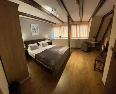 Ein Bett oder Betten in einem Zimmer der Unterkunft Hotel Restaurant Iris