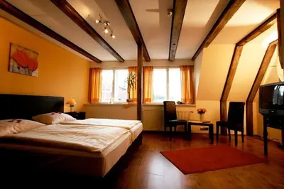 Ein Bett oder Betten in einem Zimmer der Unterkunft Hotel Restaurant Iris