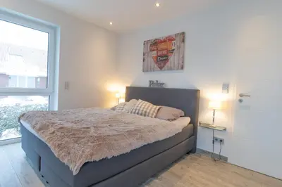 Ein Bett oder Betten in einem Zimmer der Unterkunft Ferienwohnung Suite Relax