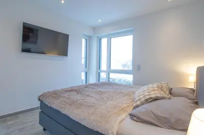 Ein Bett oder Betten in einem Zimmer der Unterkunft Ferienwohnung Suite Relax