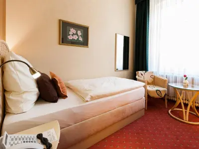 Ein Sitzbereich in der Unterkunft Park-Hotel