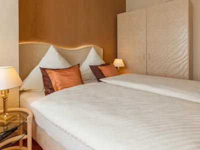 Ein Bett oder Betten in einem Zimmer der Unterkunft Park-Hotel