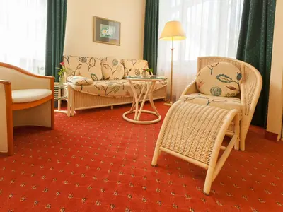 Ein Sitzbereich in der Unterkunft Park-Hotel