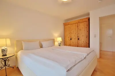 Ein Bett oder Betten in einem Zimmer der Unterkunft Kurparkresidenz Timmendorfer Strand Appartement 31