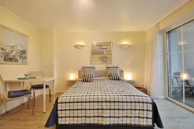 Ein Bett oder Betten in einem Zimmer der Unterkunft Kurparkresidenz Timmendorfer Strand Appartement 32