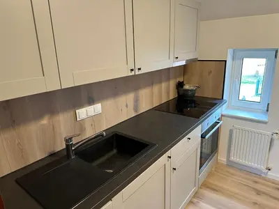 Küche/Küchenzeile in der Unterkunft Große Ferienwohnung in Ostseenähe