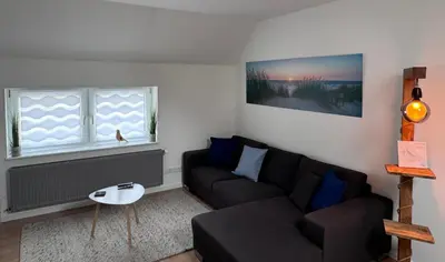 Ein Sitzbereich in der Unterkunft Große Ferienwohnung in Ostseenähe