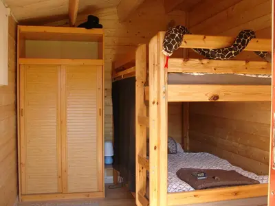 Ein Etagenbett oder Etagenbetten in einem Zimmer der Unterkunft NEU! Anitas Ostseefewo Nähe Lübeck