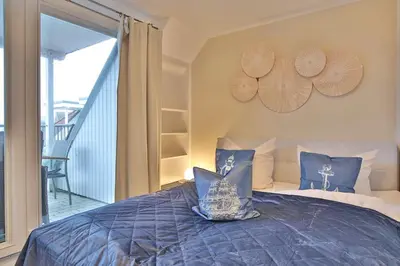 Ein Bett oder Betten in einem Zimmer der Unterkunft Seebrücke Appartement 20