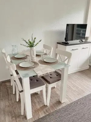 TV/Unterhaltungsangebot in der Unterkunft Strandnahe Wohnung mit Meerblick