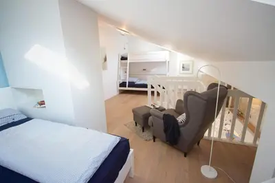 Ein Bett oder Betten in einem Zimmer der Unterkunft STA200 Ferienwohnung Dünengras