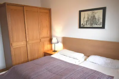 Ein Bett oder Betten in einem Zimmer der Unterkunft Sonnenseite Ferienwohnung