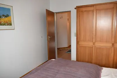 Ein Bett oder Betten in einem Zimmer der Unterkunft Sonnenseite Ferienwohnung