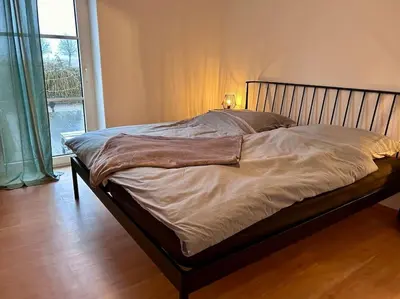 Ein Bett oder Betten in einem Zimmer der Unterkunft Ferienhaus am Poggensee