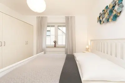 Ein Bett oder Betten in einem Zimmer der Unterkunft Ferienwohnung Jankar