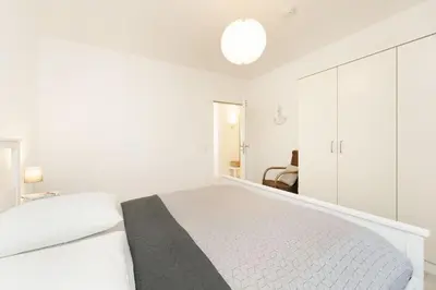 Ein Bett oder Betten in einem Zimmer der Unterkunft Ferienwohnung Jankar
