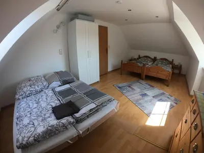 Ein Bett oder Betten in einem Zimmer der Unterkunft FeWo-Biewald