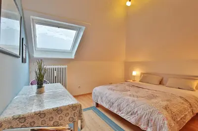 Ein Bett oder Betten in einem Zimmer der Unterkunft Haus Ludwigstraße Haus Ludwigstrasse 27 Appartement 11