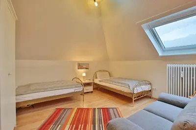 Ein Bett oder Betten in einem Zimmer der Unterkunft Haus Ludwigstraße Haus Ludwigstrasse 27 Appartement 11