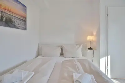 Ein Bett oder Betten in einem Zimmer der Unterkunft Haus Oceanfront, Appartement 9