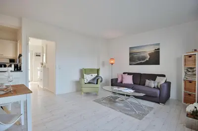 Ein Sitzbereich in der Unterkunft Haus Oceanfront, Appartement 9