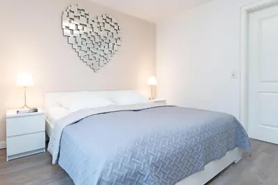Ein Bett oder Betten in einem Zimmer der Unterkunft Schmiedestraße 7 Muschelsand