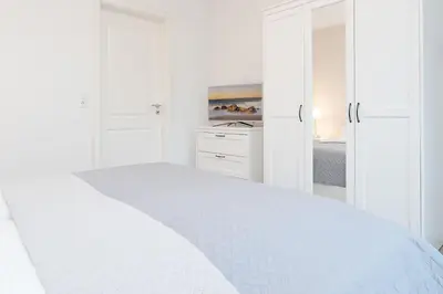 Ein Bett oder Betten in einem Zimmer der Unterkunft Schmiedestraße 7 Muschelsand