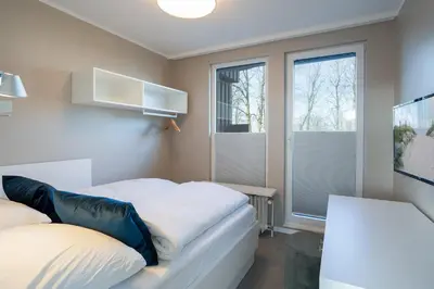 Ein Bett oder Betten in einem Zimmer der Unterkunft PAR1 Ferienwohnung Appartement 28