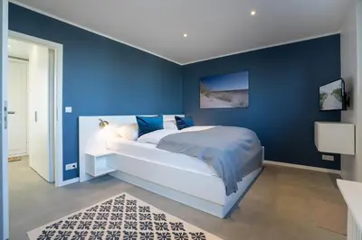 Ein Bett oder Betten in einem Zimmer der Unterkunft PAR1 Ferienwohnung Appartement 28