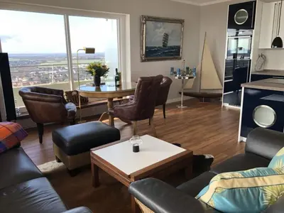 Ein Sitzbereich in der Unterkunft Queen Mary Maritim Residenz Travemünde