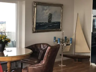 Ein Sitzbereich in der Unterkunft Queen Mary Maritim Residenz Travemünde