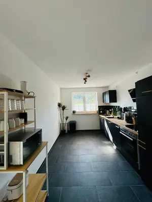 Küche/Küchenzeile in der Unterkunft Familientraum an der wunderschönen Ostsee in Scharbeutz - Strandnah, kostenloses Parken & Terasse!W2