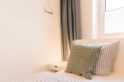 Ein Bett oder Betten in einem Zimmer der Unterkunft Ferienwohnung Urlaubsflair