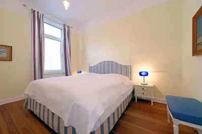 Ein Bett oder Betten in einem Zimmer der Unterkunft Morning House Ferienwohnung 1