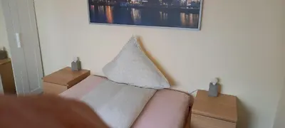 Ein Bett oder Betten in einem Zimmer der Unterkunft Ferienwohnung Lützowstrasse 2