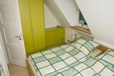 Ein Bett oder Betten in einem Zimmer der Unterkunft Appartement Meißner - Strand-und Bahnhofsnah