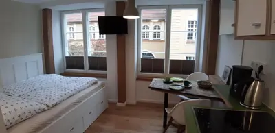 Ein Bett oder Betten in einem Zimmer der Unterkunft Ferienwohnung Belle Etage im Traufenhaus
