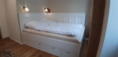 Ein Bett oder Betten in einem Zimmer der Unterkunft Ferienwohnung Belle Etage im Traufenhaus