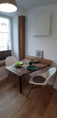 Ein Sitzbereich in der Unterkunft Ferienwohnung Belle Etage im Traufenhaus