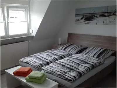 Ein Bett oder Betten in einem Zimmer der Unterkunft Holiday apartment Grohnert
