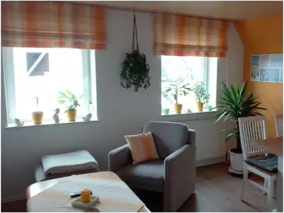 Ein Sitzbereich in der Unterkunft Holiday apartment Grohnert