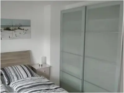 Ein Bett oder Betten in einem Zimmer der Unterkunft Holiday apartment Grohnert