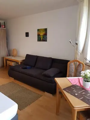 Ein Sitzbereich in der Unterkunft Apartment am Hafen