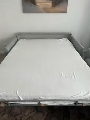 Ein Bett oder Betten in einem Zimmer der Unterkunft ButschisBude