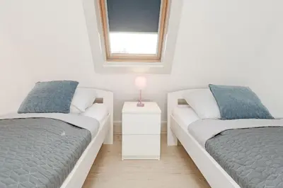 Ein Bett oder Betten in einem Zimmer der Unterkunft Fischerhus