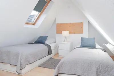Ein Bett oder Betten in einem Zimmer der Unterkunft Fischerhus